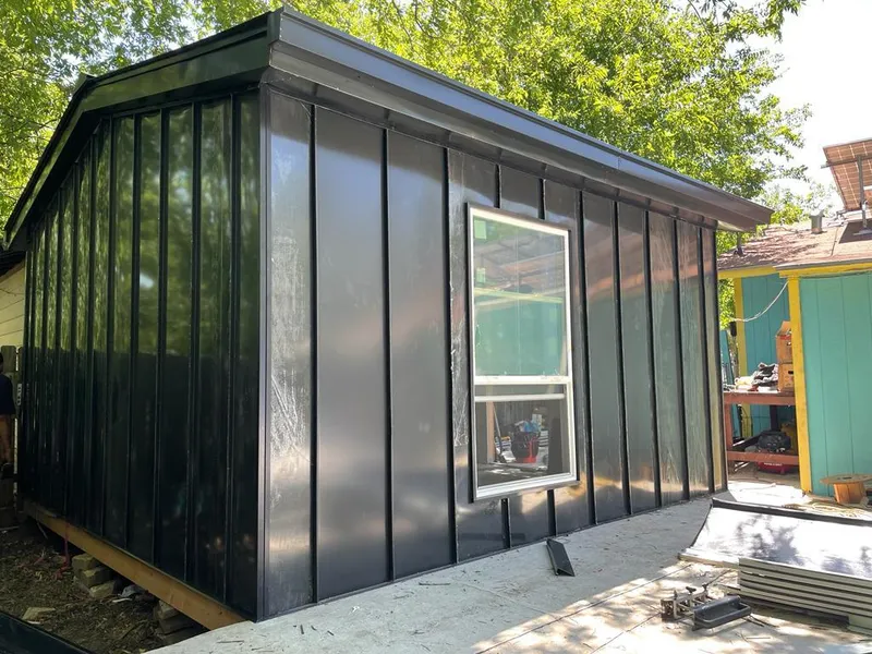 Black standing seam metal wall panels for Metal Roof Installation in Western Springs