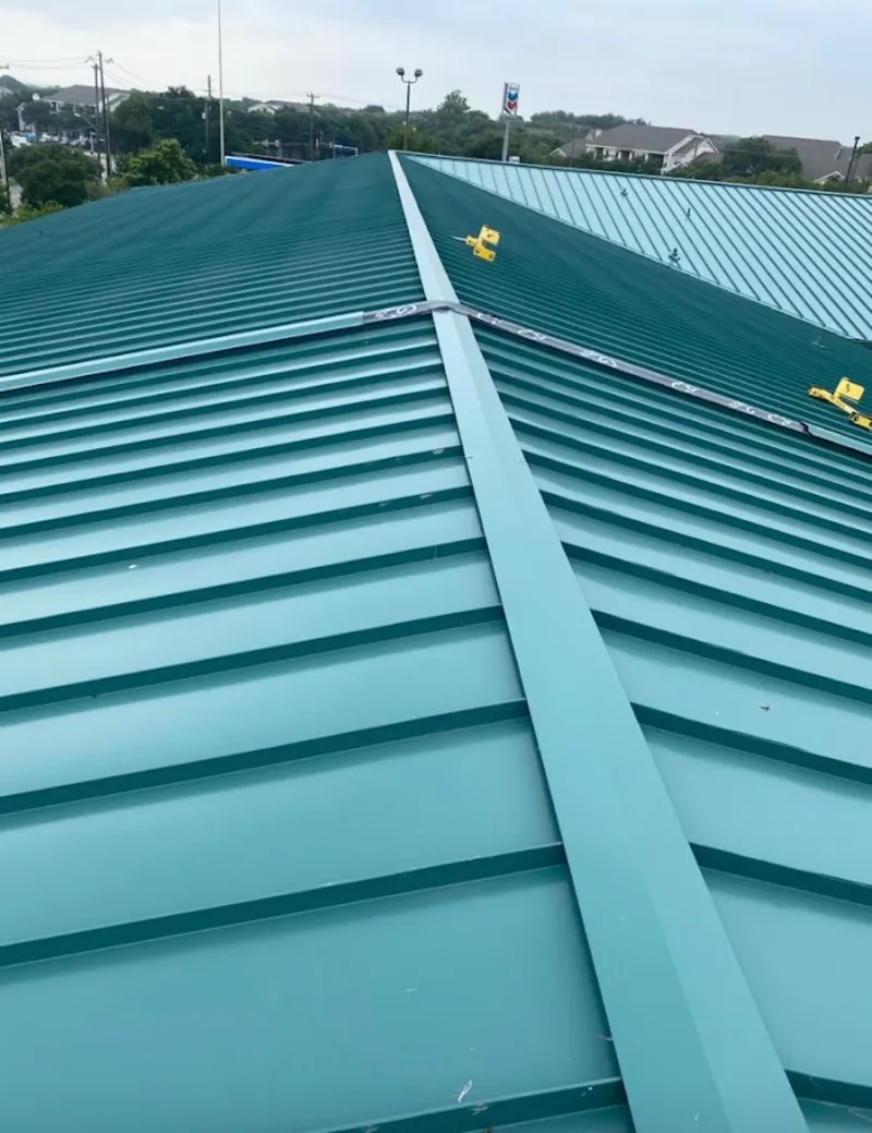 Green commercial metal roof ridge and valley for Metal Roof Repair in Western Springs