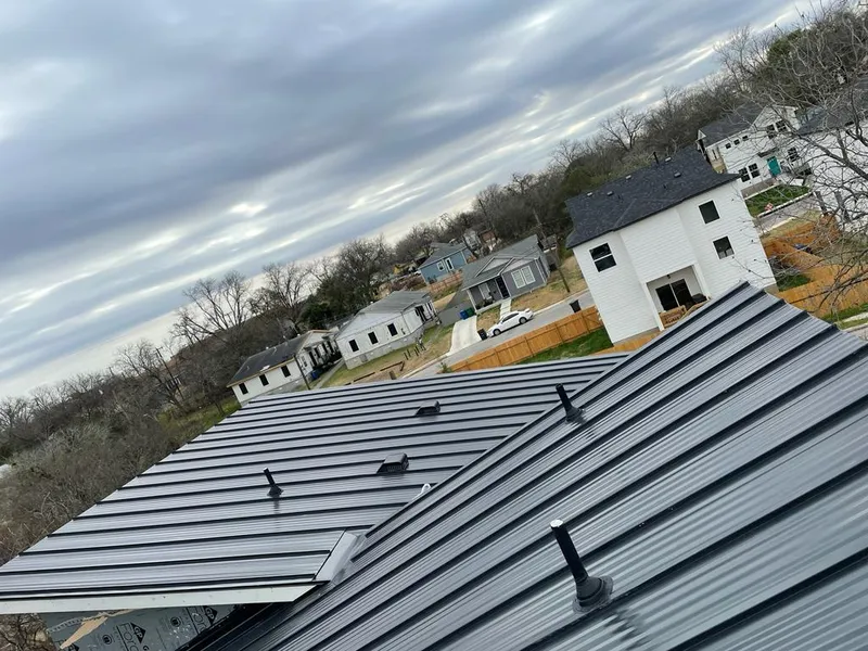 Standing seam metal roof panels with vents for Skylight Repair in Western Springs